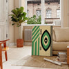 Poster showing minimalist Bauhaus geometric composition in modernist style - in a Parisian living room with a sofa and a fig plant