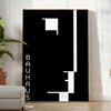 Composição geométrica em preto e cinza inspirada no design Bauhaus - num quarto luminoso e minimalista com planta e poltrona