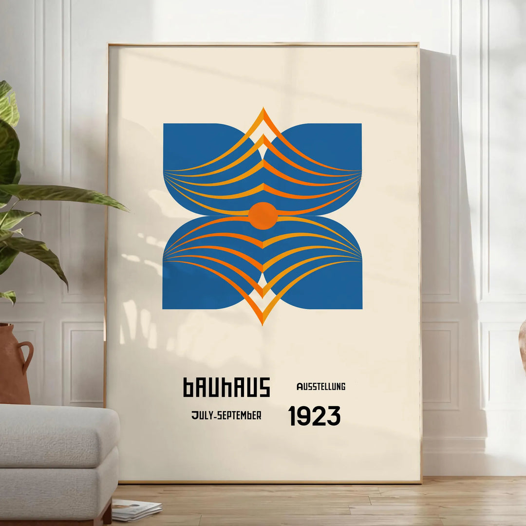 Bauhaus poster showing abstract geometric composition in minimalist modernist style - in a bright minimalist room with a plant and an armchair