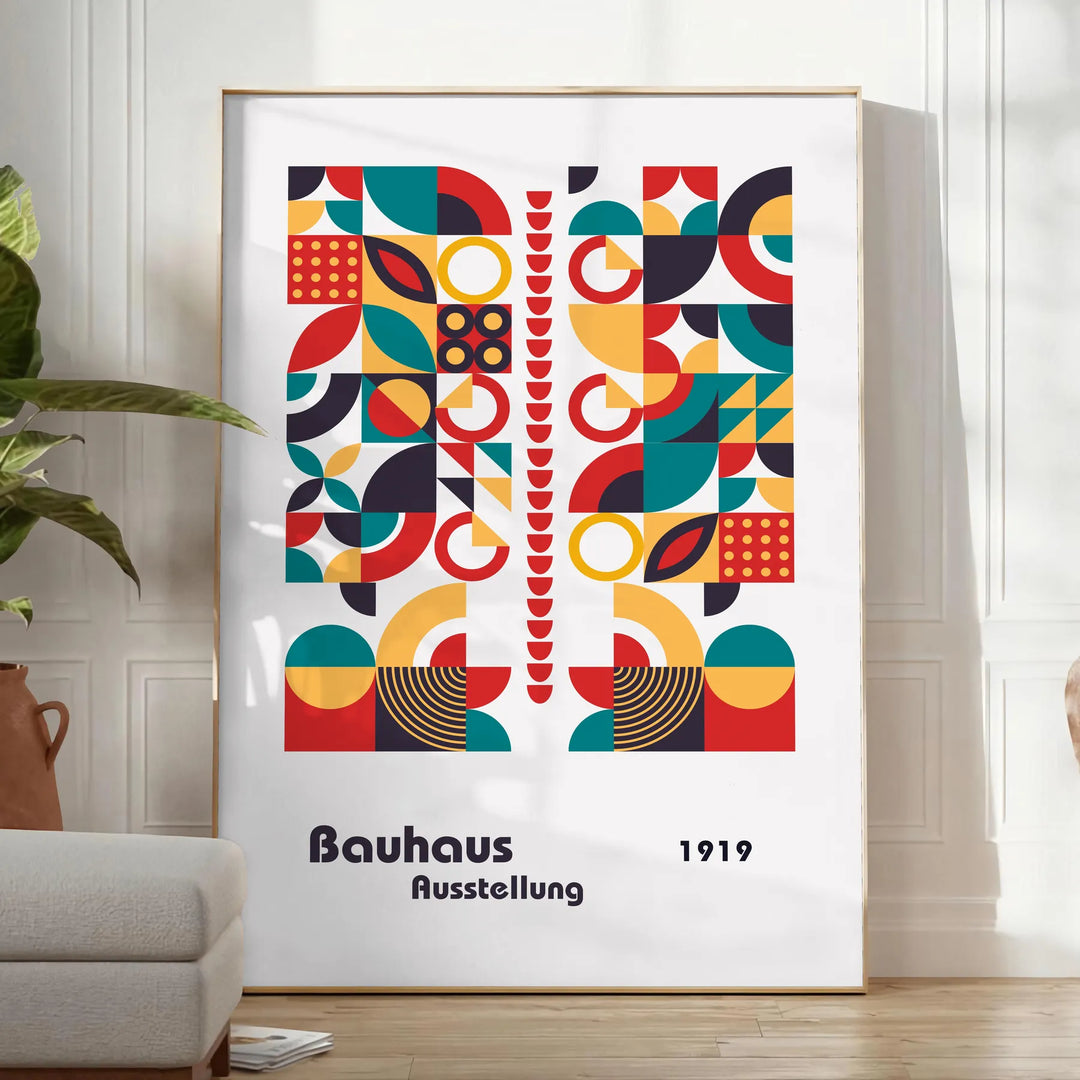 Poster of abstract Bauhaus geometric artwork in white and red - in a bright minimalist room with a plant and an armchair