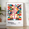 Poster of abstract Bauhaus geometric artwork in white and red - in a bright minimalist room with a plant and an armchair