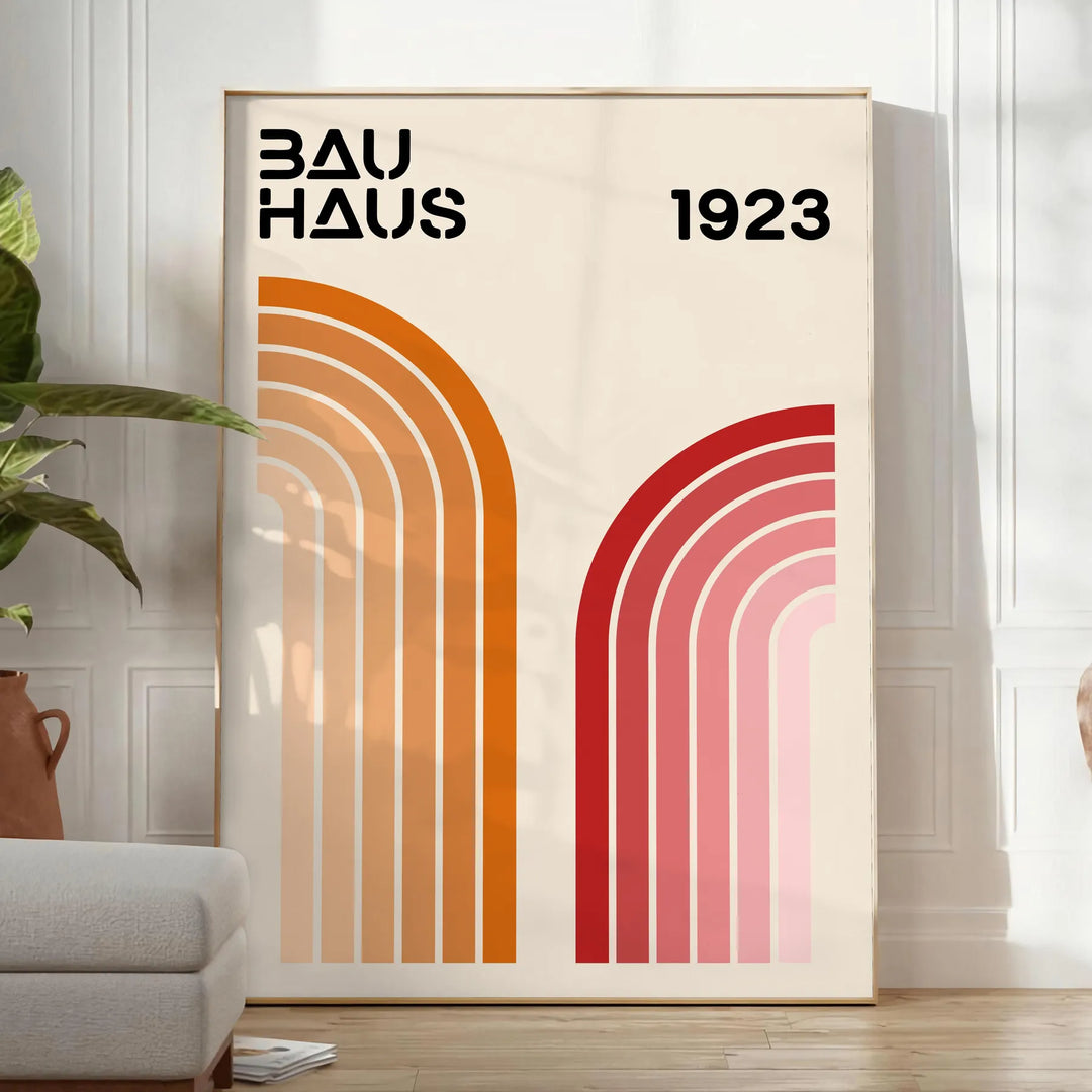Bauhaus poster showing abstract geometric forms and minimalist composition on paper - in a bright minimalist room with a plant and an armchair