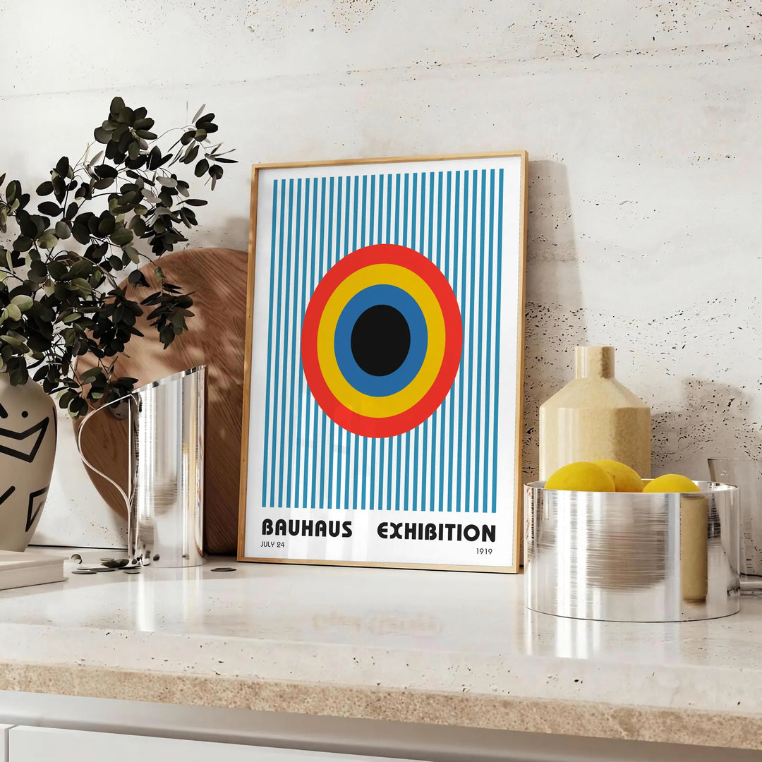 Geometric abstract shapes in gray and brown, inspired by Bauhaus style - styled on a counter with eucalyptus and a bowl of lemons