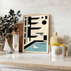Bauhaus-style swimming pool with geometric shapes and bold colors - styled on a counter with eucalyptus and a bowl of lemons