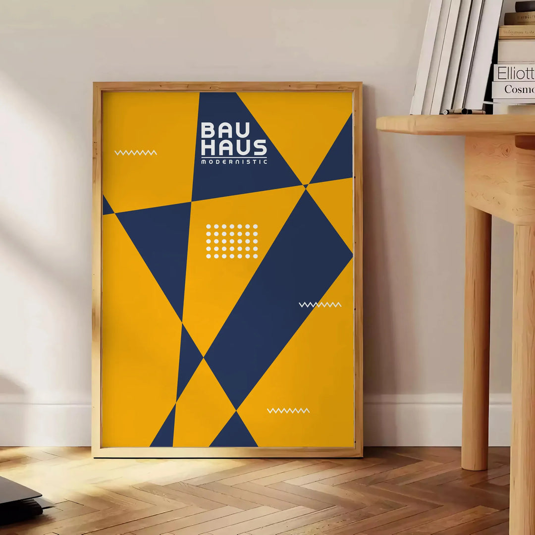 Poster showing abstract geometric composition in Bauhaus style, minimal modern design - beside a round wooden side table with books