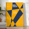 Poster showing abstract geometric composition in Bauhaus style, minimal modern design - in a bright minimalist room with a plant and an armchair