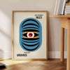 Bauhaus style geometric poster showing abstract shapes in minimalist composition - beside a round wooden side table with books