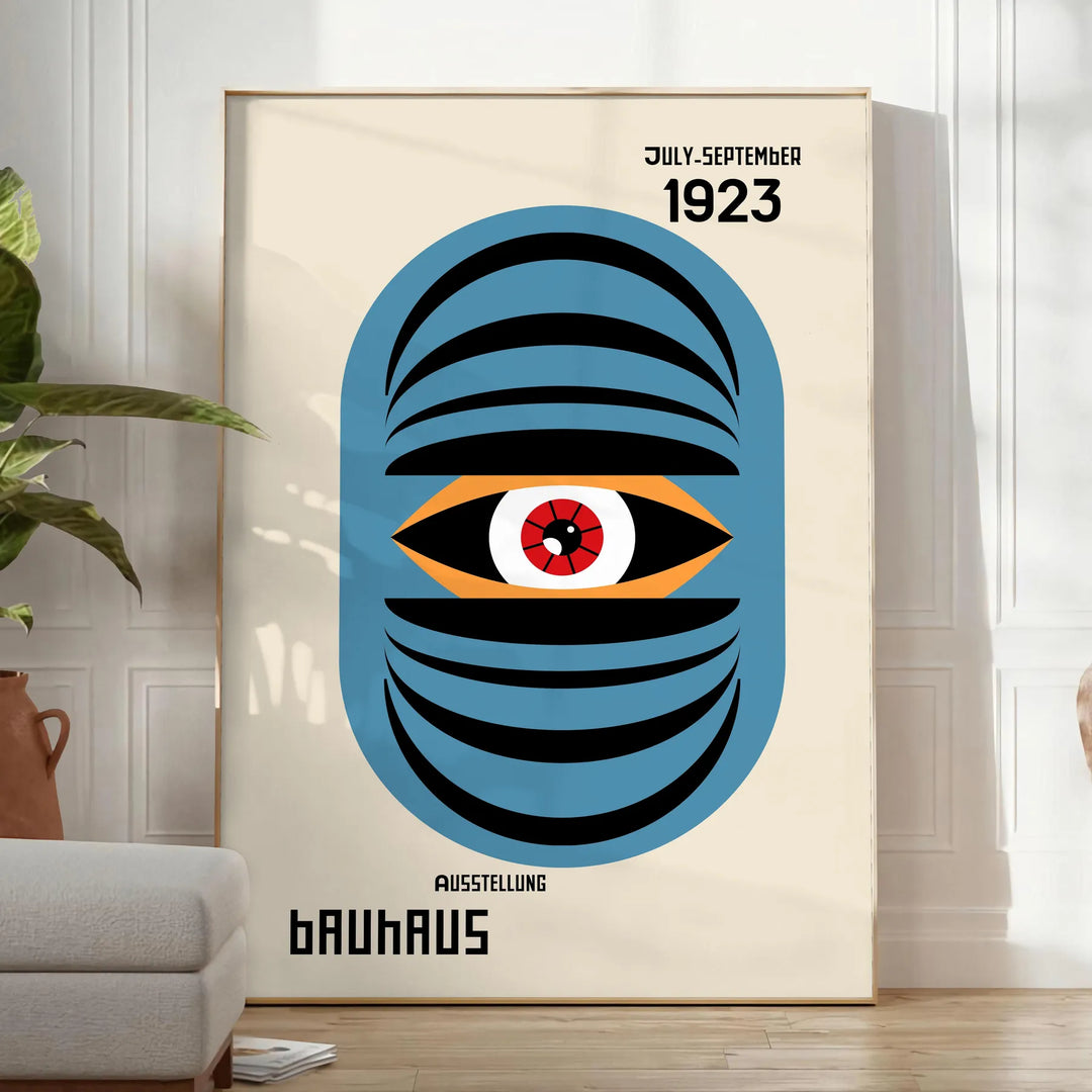 Bauhaus style geometric poster showing abstract shapes in minimalist composition - in a bright minimalist room with a plant and an armchair