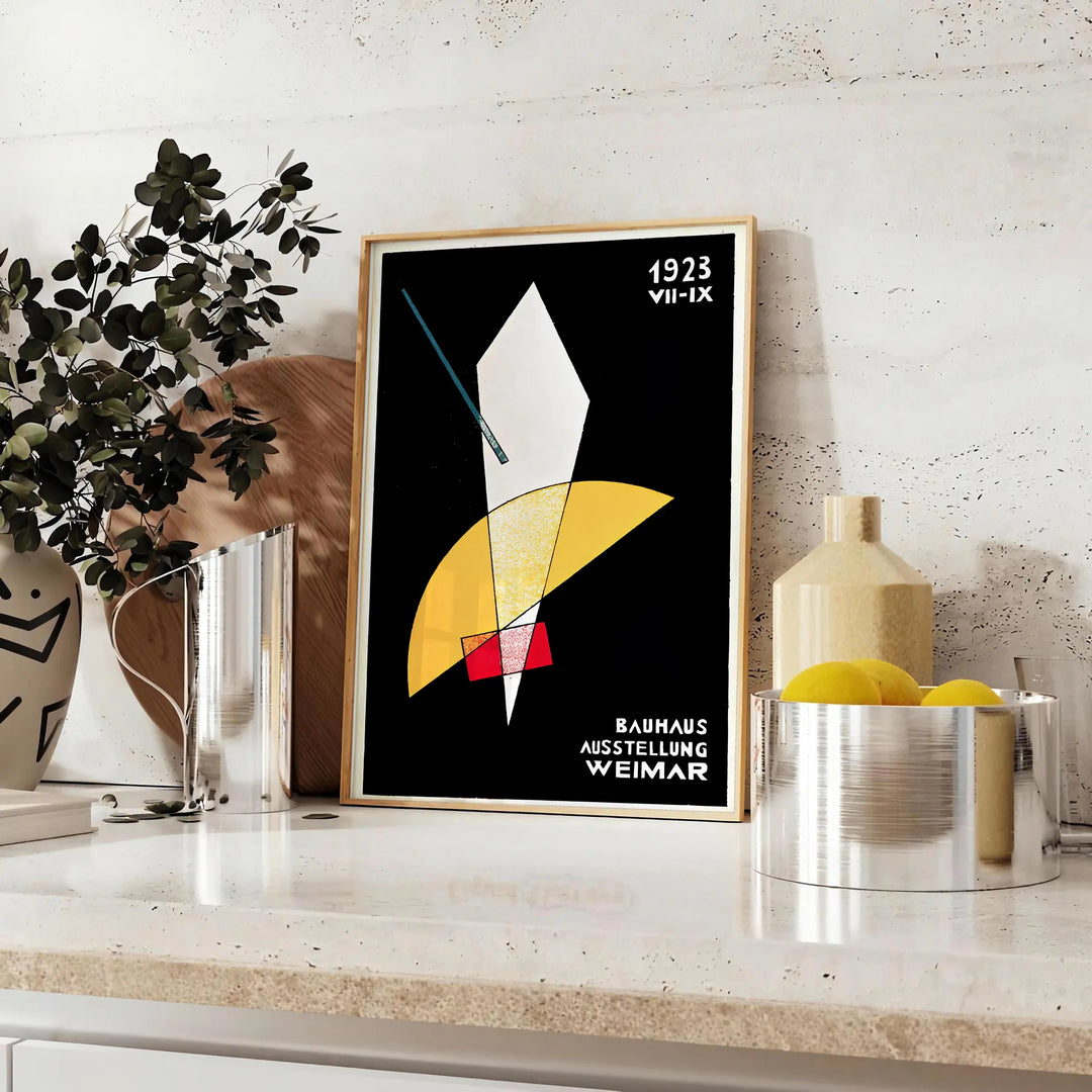 Abstract Bauhaus design featuring groovy shapes in orange and black - styled on a counter with eucalyptus and a bowl of lemons