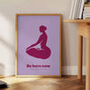 Abstract yoga figure in calming blue and purple tones - beside a round wooden side table with books