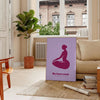 Abstract yoga figure in calming blue and purple tones - in a Parisian living room with a sofa and a fig plant