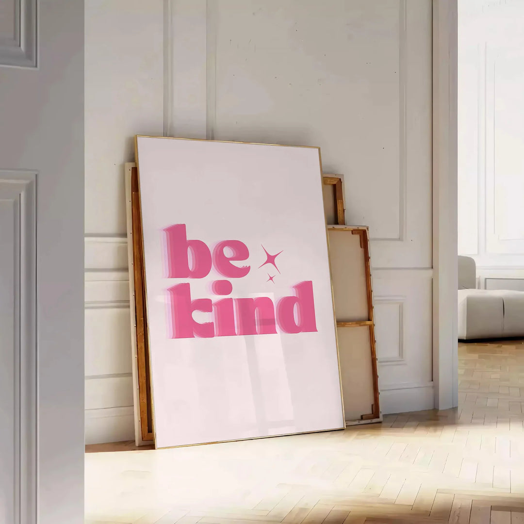 Colorful abstract design featuring the phrase 'Be Kind' in playful typography - leaning on a herringbone floor against a white panelled wall