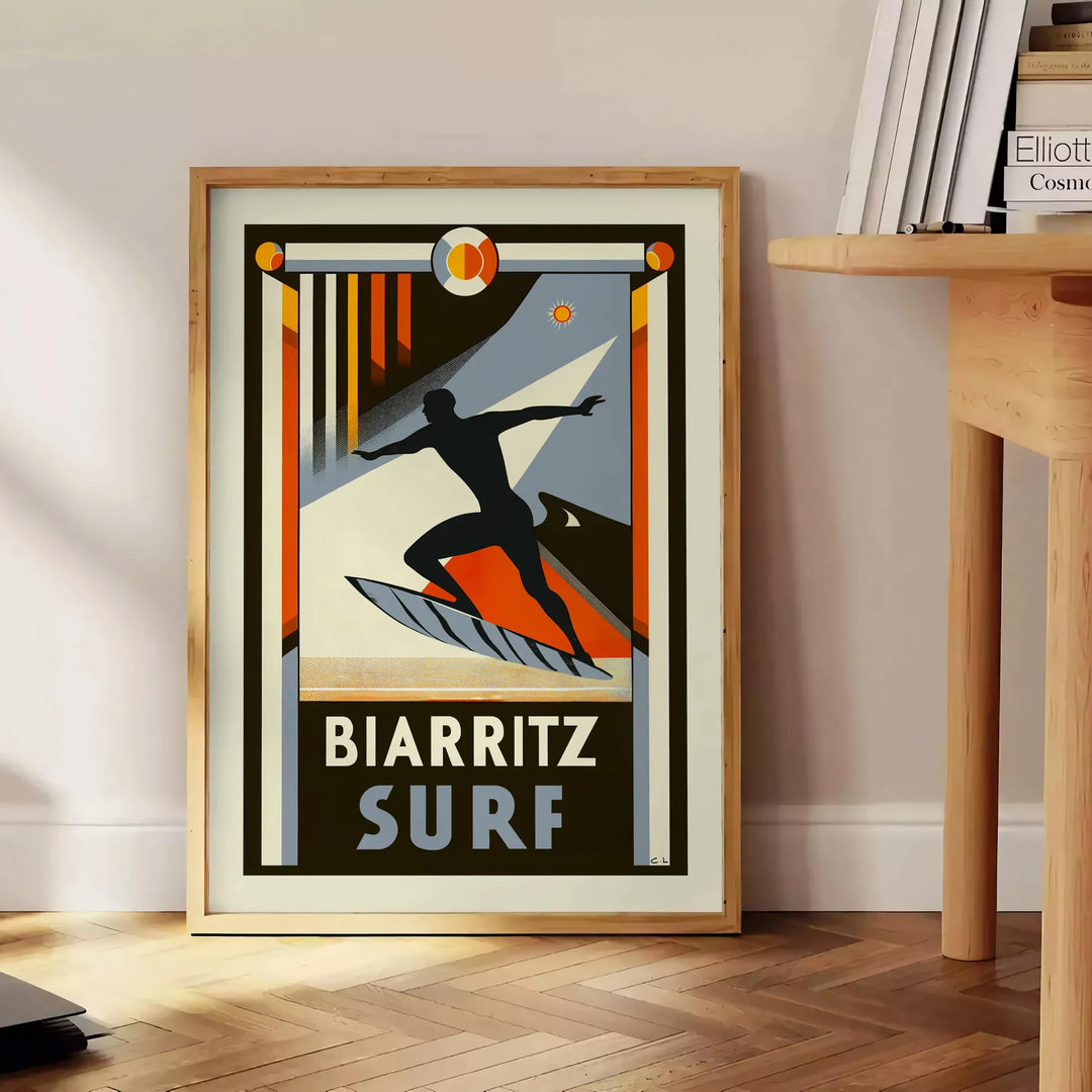 Orange and black Biarritz surf poster in minimalist retro graphic style - beside a round wooden side table with books