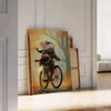 A stylized rat riding a bicycle, featuring bold black and orange colors - leaning on a herringbone floor against a white panelled wall