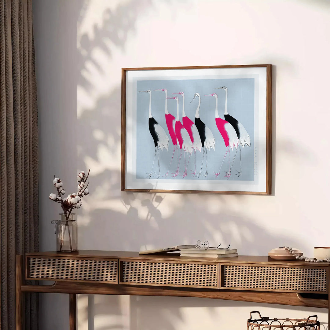 A stylized bird illustration in black and blue tones - styled on a counter with eucalyptus and a bowl of lemons