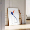 Colorful bird illustration with orange and blue hues on a dark background - leaning on a herringbone floor against a white panelled wall