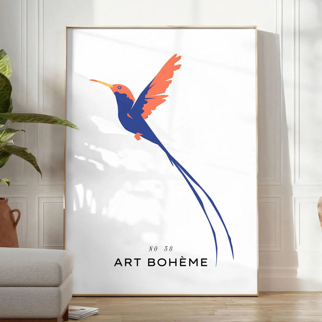 Colorful bird illustration with orange and blue hues on a dark background - in a bright minimalist room with a plant and an armchair