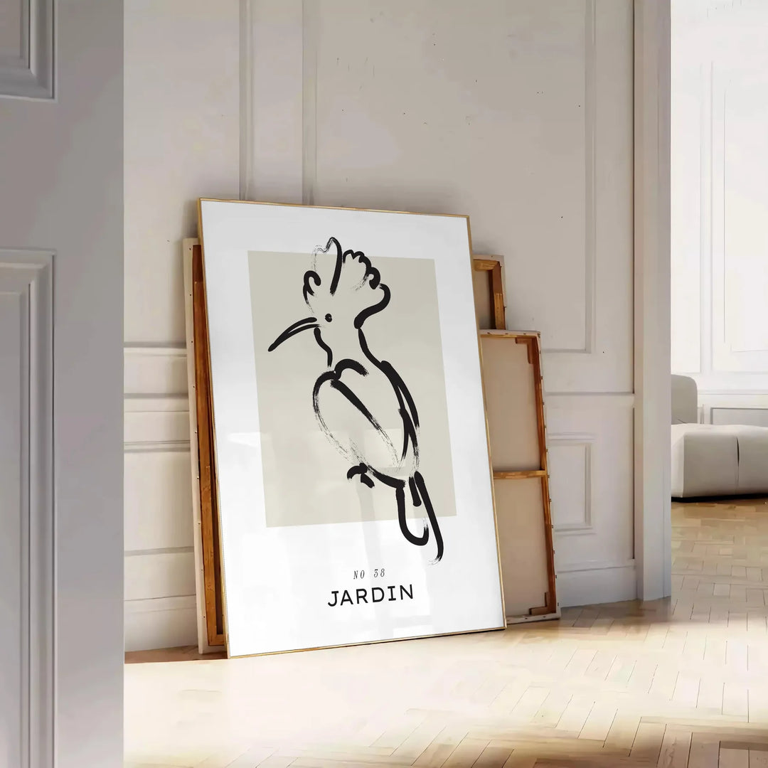 A bohemian-style poster featuring a bird in shades of gray and black - leaning on a herringbone floor against a white panelled wall