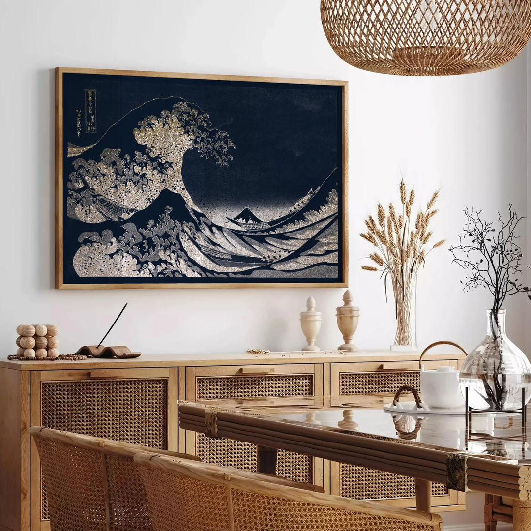 Black and white depiction of Hokusai's wave with green accents - in a Parisian living room with a sofa and a fig plant