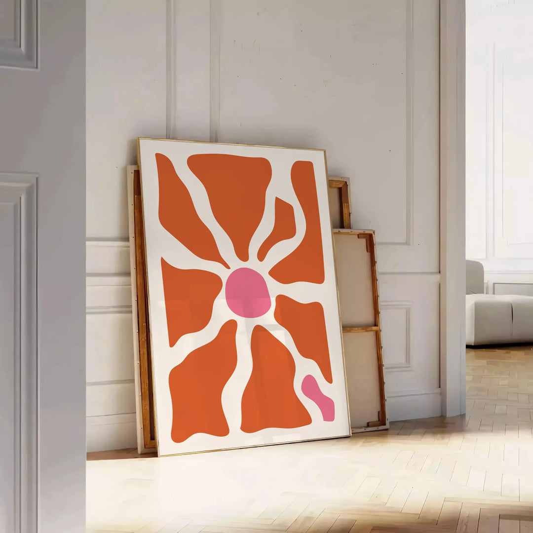 Abstract shapes in warm browns and oranges with a bohemian style - leaning on a herringbone floor against a white panelled wall