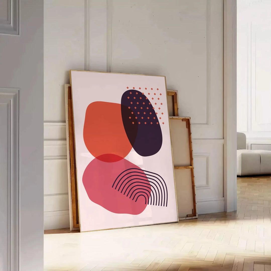 Colorful abstract shapes and patterns in a boho style - leaning on a herringbone floor against a white panelled wall
