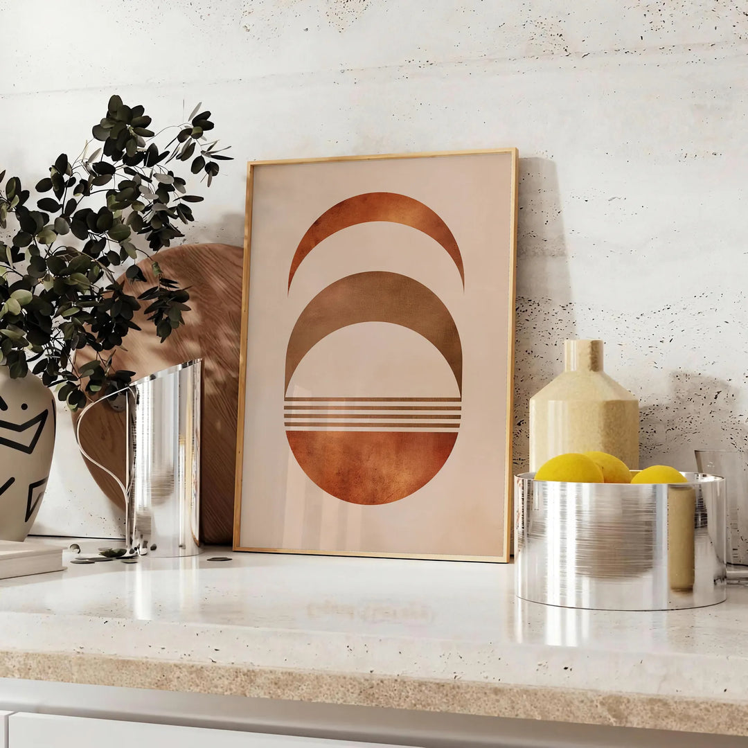 Abstract shapes in earthy browns and greens with a boho style - styled on a counter with eucalyptus and a bowl of lemons