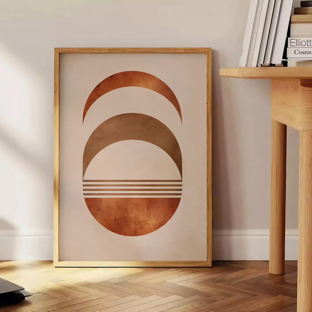 Abstract shapes in earthy browns and greens with a boho style - beside a round wooden side table with books