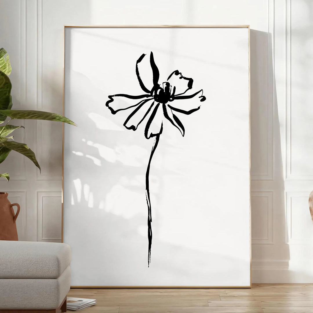 Composição abstrata com tons de cinza e preto em estilo boêmio - num quarto luminoso e minimalista com planta e poltrona