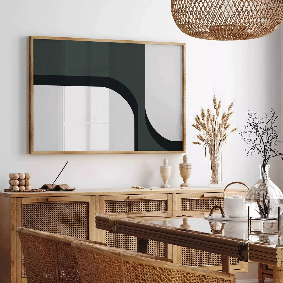 Abstract shapes in gray and green tones with a boho style - in a Parisian living room with a sofa and a fig plant