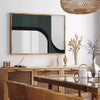 Abstract shapes in gray and green tones with a boho style - in a Parisian living room with a sofa and a fig plant