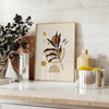 Abstract composition with earthy tones and organic shapes - styled on a counter with eucalyptus and a bowl of lemons