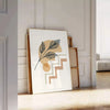 Abstract boho design with earthy tones and flowing shapes - leaning on a herringbone floor against a white panelled wall