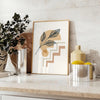 Abstract boho design with earthy tones and flowing shapes - styled on a counter with eucalyptus and a bowl of lemons