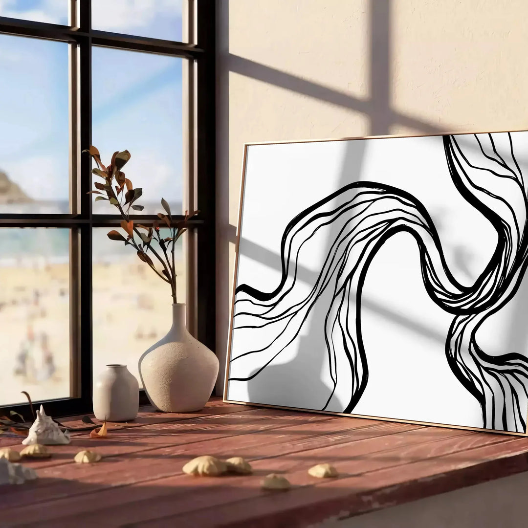 Abstract bohemian design with gray and black tones - leaning on a herringbone floor against a white panelled wall