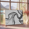 Abstract bohemian design with gray and black tones - beside a round wooden side table with books