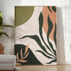 Abstract bohemian design with gray and green tones - in a bright minimalist room with a plant and an armchair