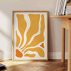 Colorful abstract shapes and patterns in a bohemian style - beside a round wooden side table with books