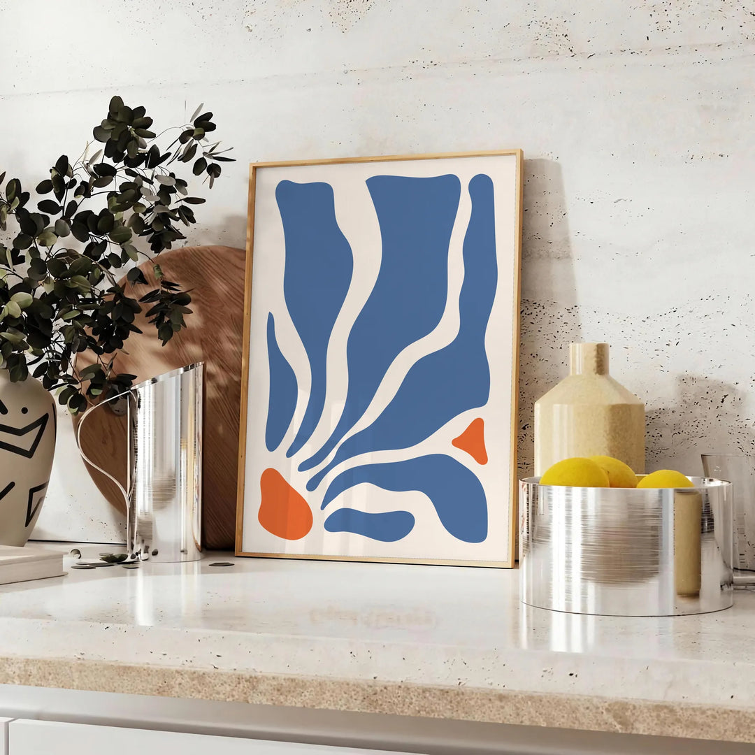 Abstract bohemian design featuring gray and orange hues - styled on a counter with eucalyptus and a bowl of lemons