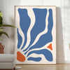 Abstract bohemian design featuring gray and orange hues - in a bright minimalist room with a plant and an armchair