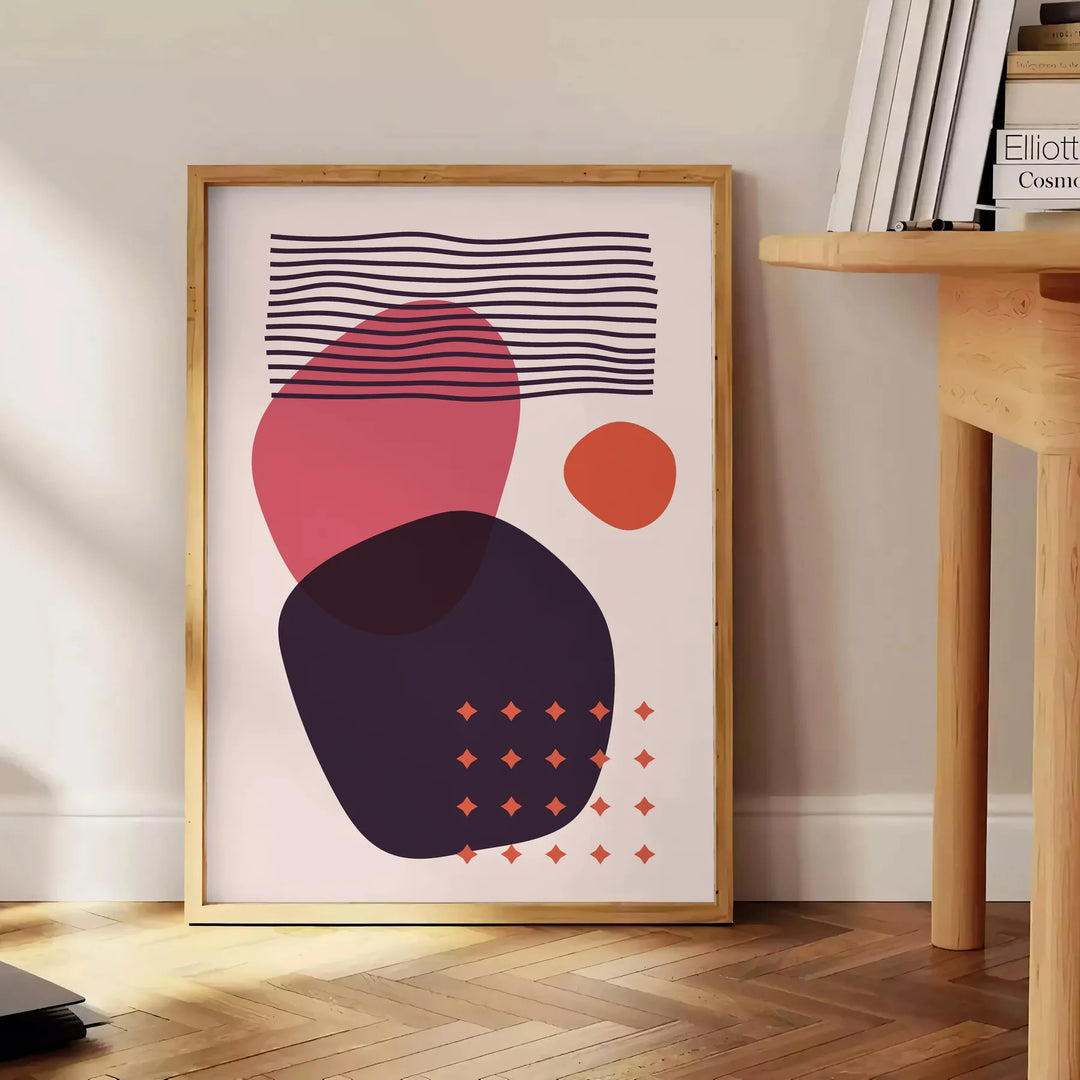 Abstract bohemian design with orange and red hues in a fluid style - beside a round wooden side table with books