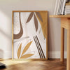 Abstract bohemian design with earthy tones and fluid shapes - beside a round wooden side table with books