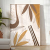 Abstract bohemian design with earthy tones and fluid shapes - in a bright minimalist room with a plant and an armchair