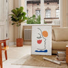 Abstract design with earthy tones and intricate patterns - in a Parisian living room with a sofa and a fig plant