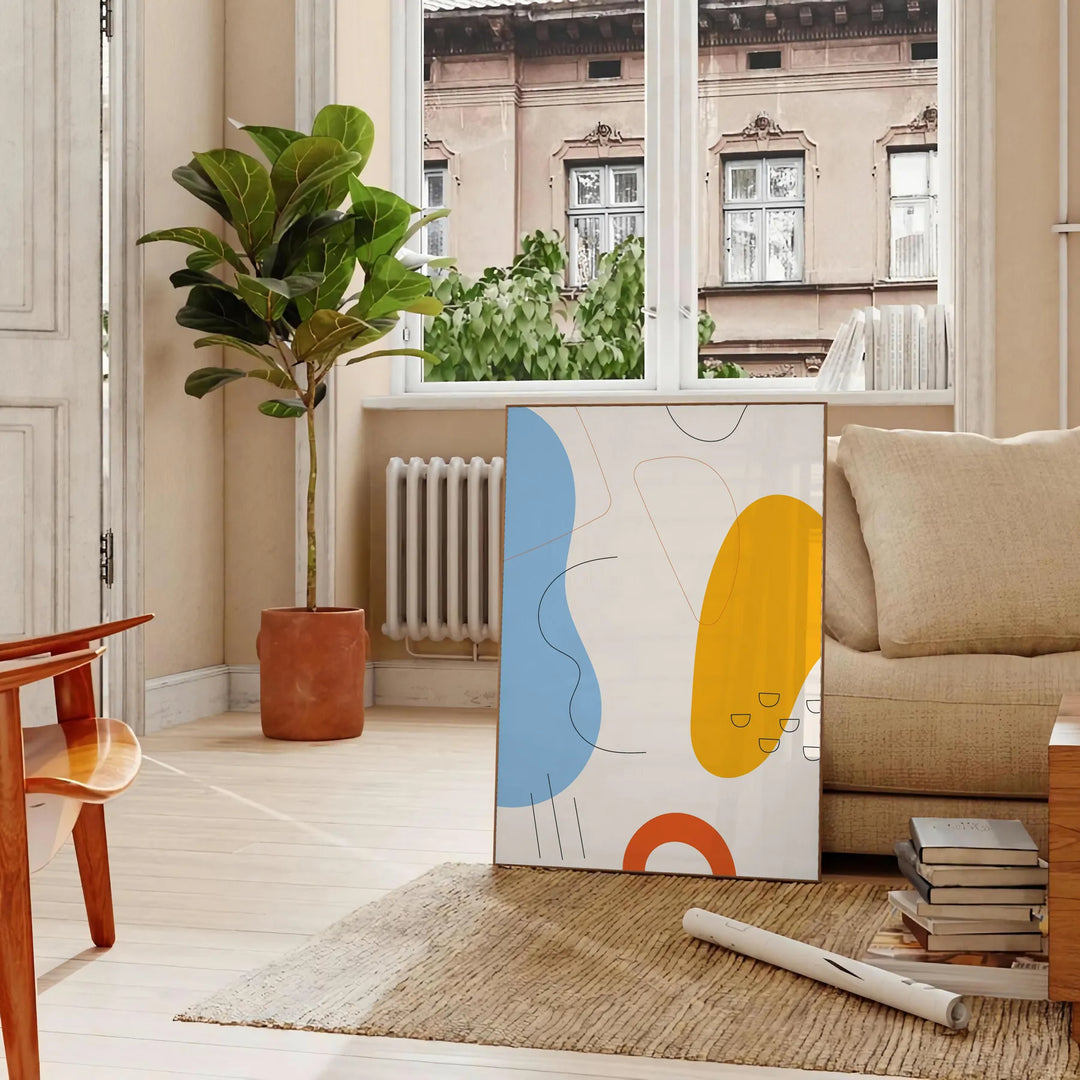 Abstract shapes and patterns in earthy tones with a bohemian style - in a Parisian living room with a sofa and a fig plant