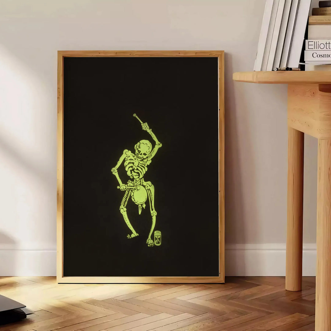 Abstract design featuring bones in black and green hues - beside a round wooden side table with books