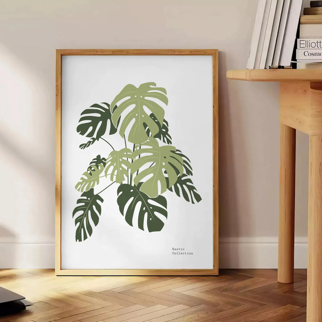 Uma ilustração botânica detalhada com folhas verdes exuberantes em fundo branco - ao lado de uma mesa de apoio redonda em madeira com livros