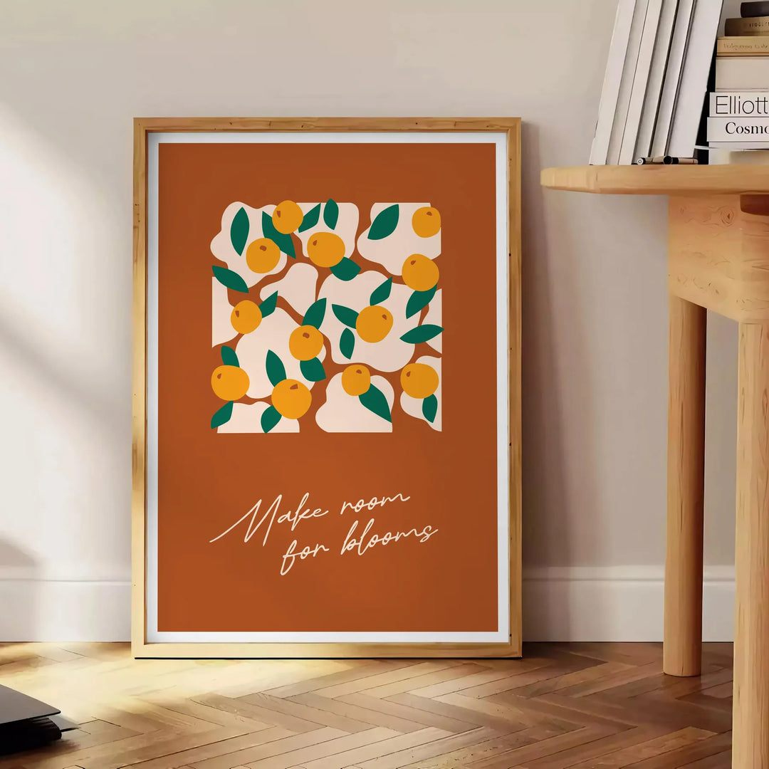 Vintage botanical illustration featuring various green plants and orange flowers - beside a round wooden side table with books