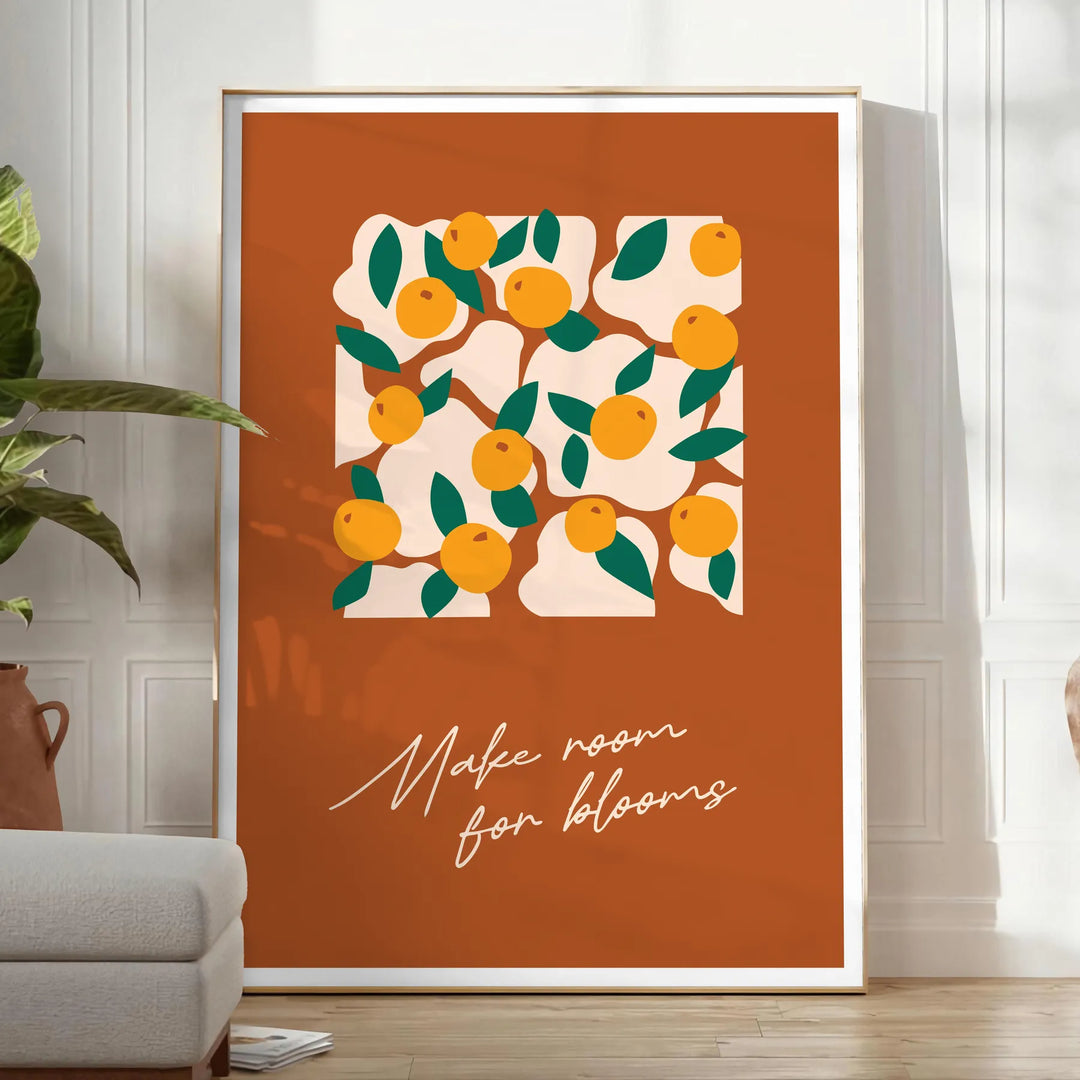 Vintage botanical illustration featuring various green plants and orange flowers - in a bright minimalist room with a plant and an armchair