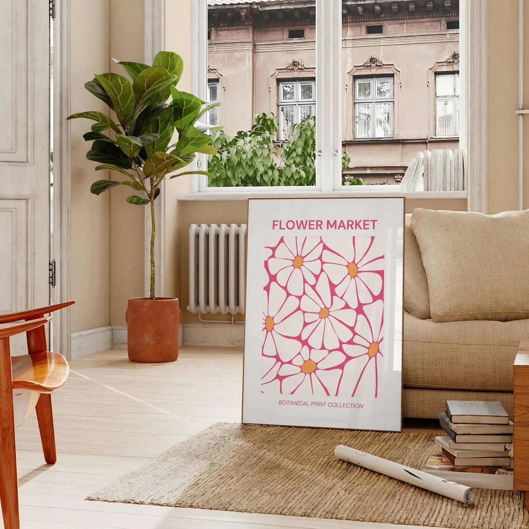 Botanical illustration featuring green leaves and yellow flowers - in a Parisian living room with a sofa and a fig plant