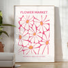 Botanical illustration featuring green leaves and yellow flowers - in a bright minimalist room with a plant and an armchair